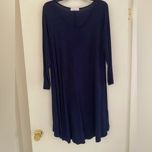 Navy cotton dress with long sleeves.